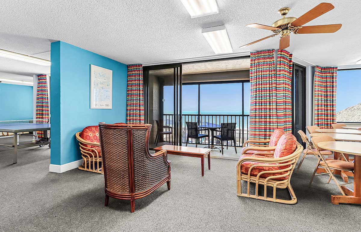 Game room with ping pong table and seating area